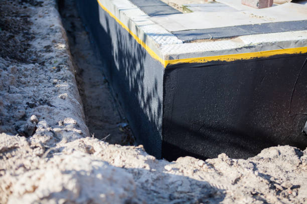 Professional Waterproofing technician working in Casco, WI